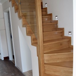 Oak stairs with glass balustrade 