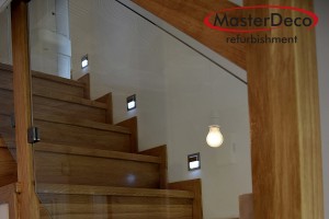Oak stairs with glass balustrade 